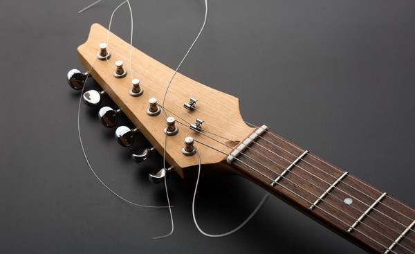 Sửa Đàn Guitar